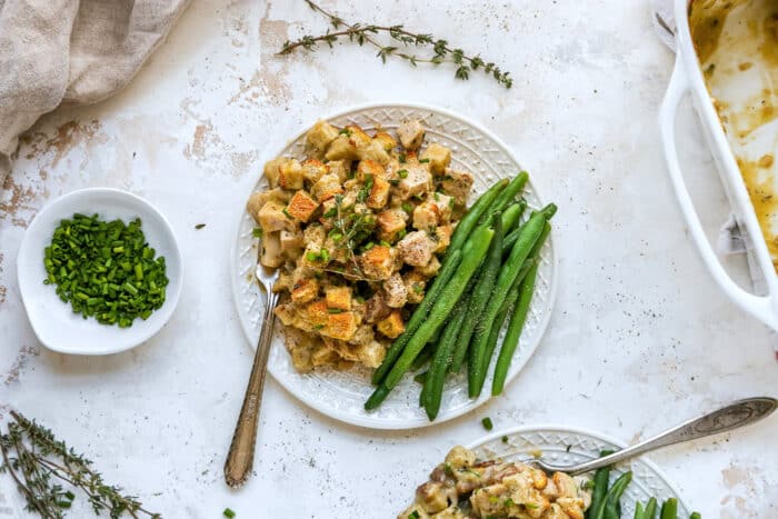 overhead photo of individual plates of leftover turkey casserole