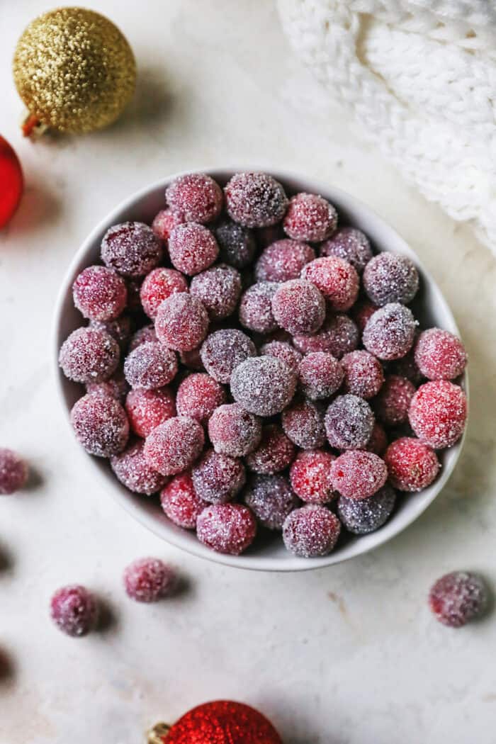 close-up of sugared cranberries in a bowl