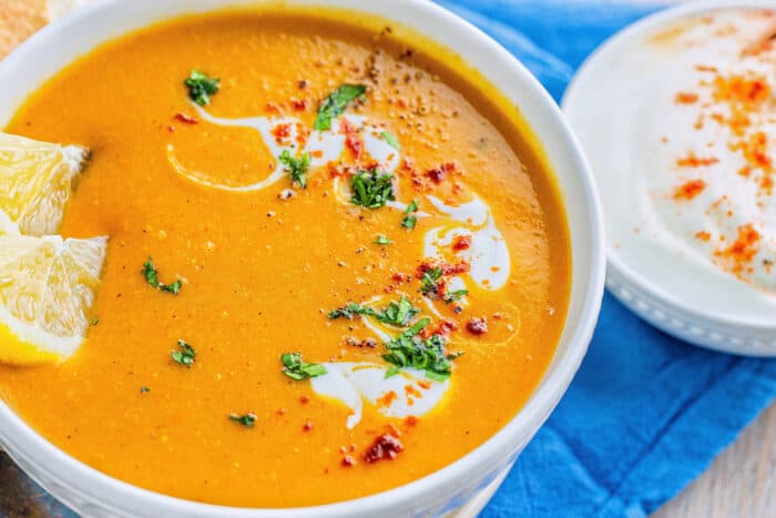 red lentil soup with dollops of Greek yogurt