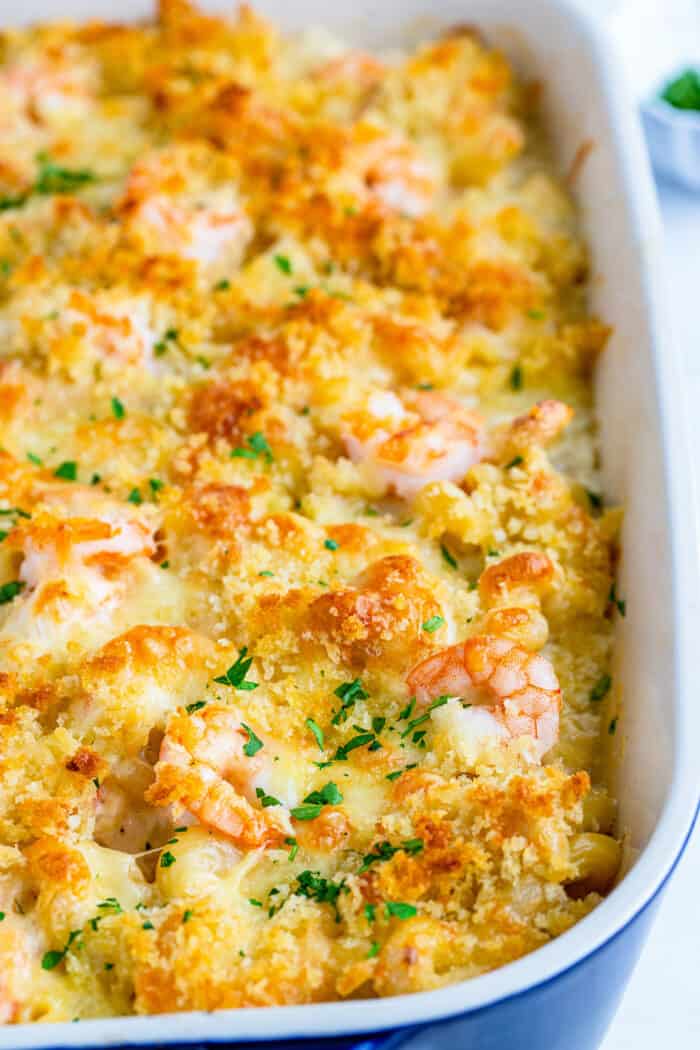 mac and cheese with shrimp, baked in a blue 9" x 13" pan