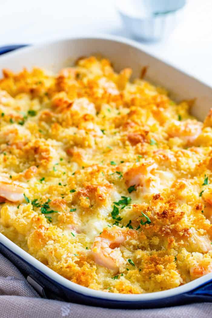 baked shrimp mac & cheese in a blue pan