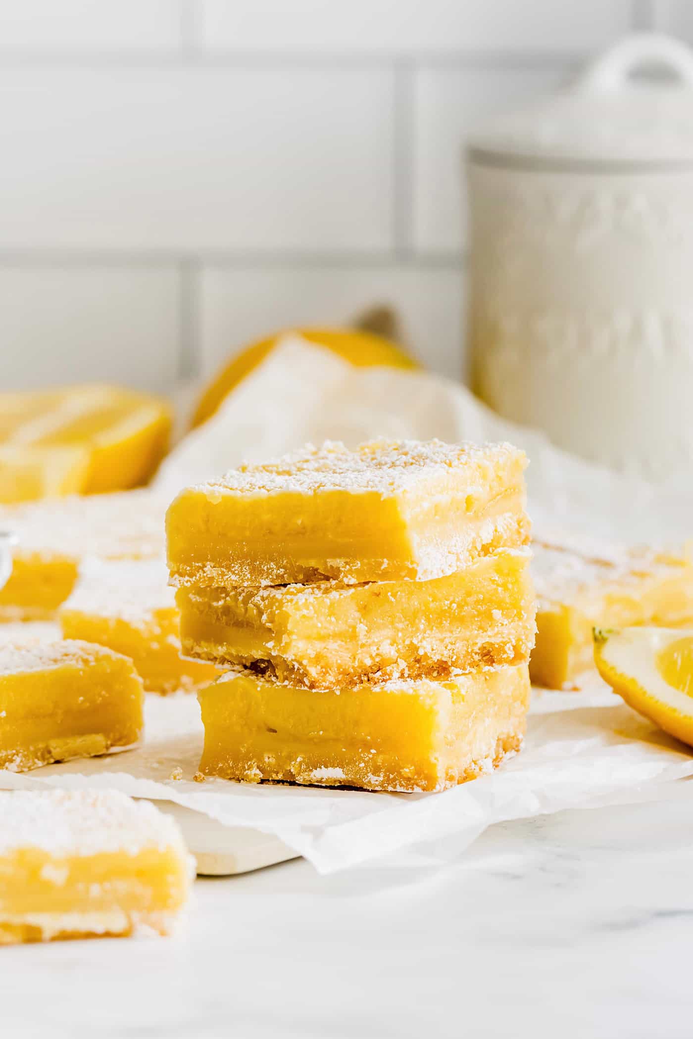 lemon bars arranged in a tall stack