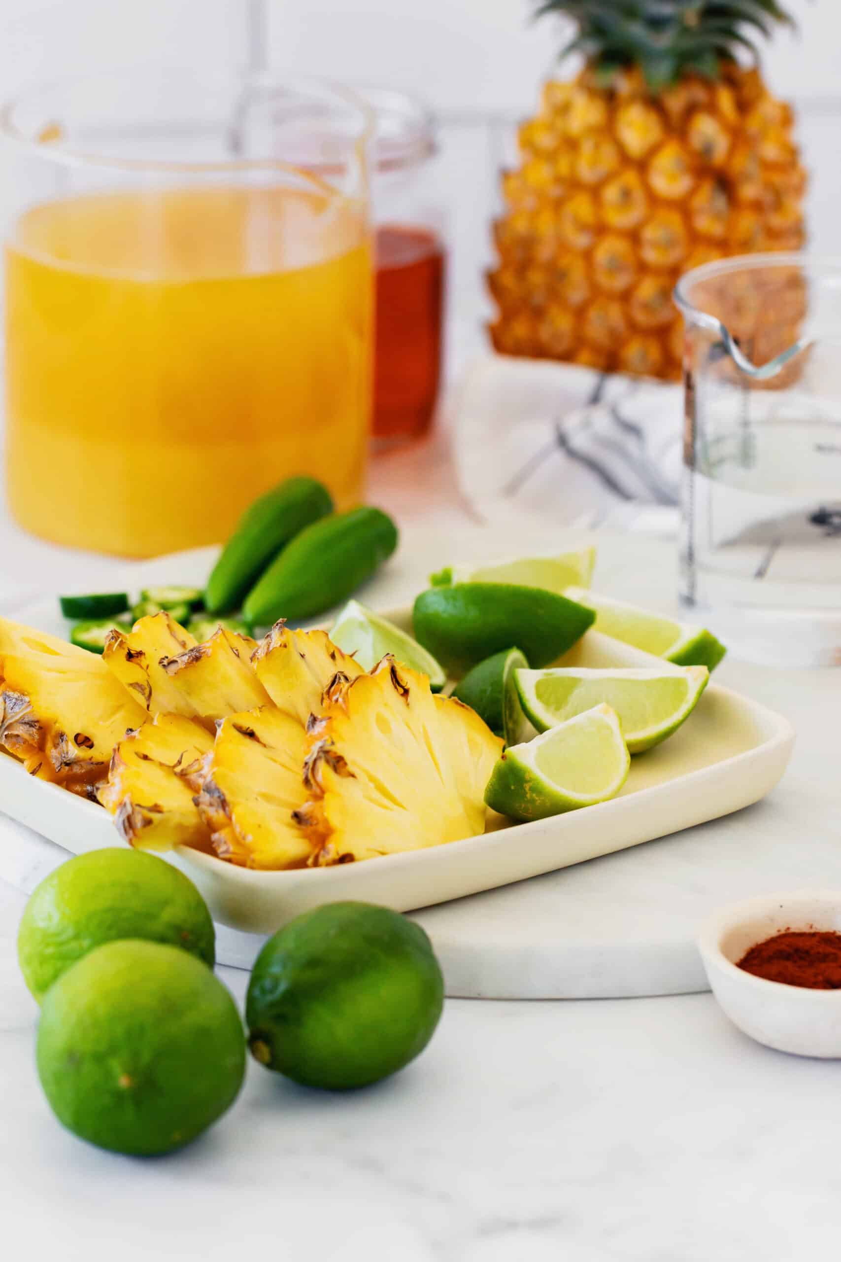 fresh pineapple, limes, and jalapeno, plus pineapple juice, tequila, and chili powder