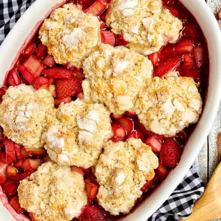 Strawberry Rhubarb Cobbler in an oval baking dish