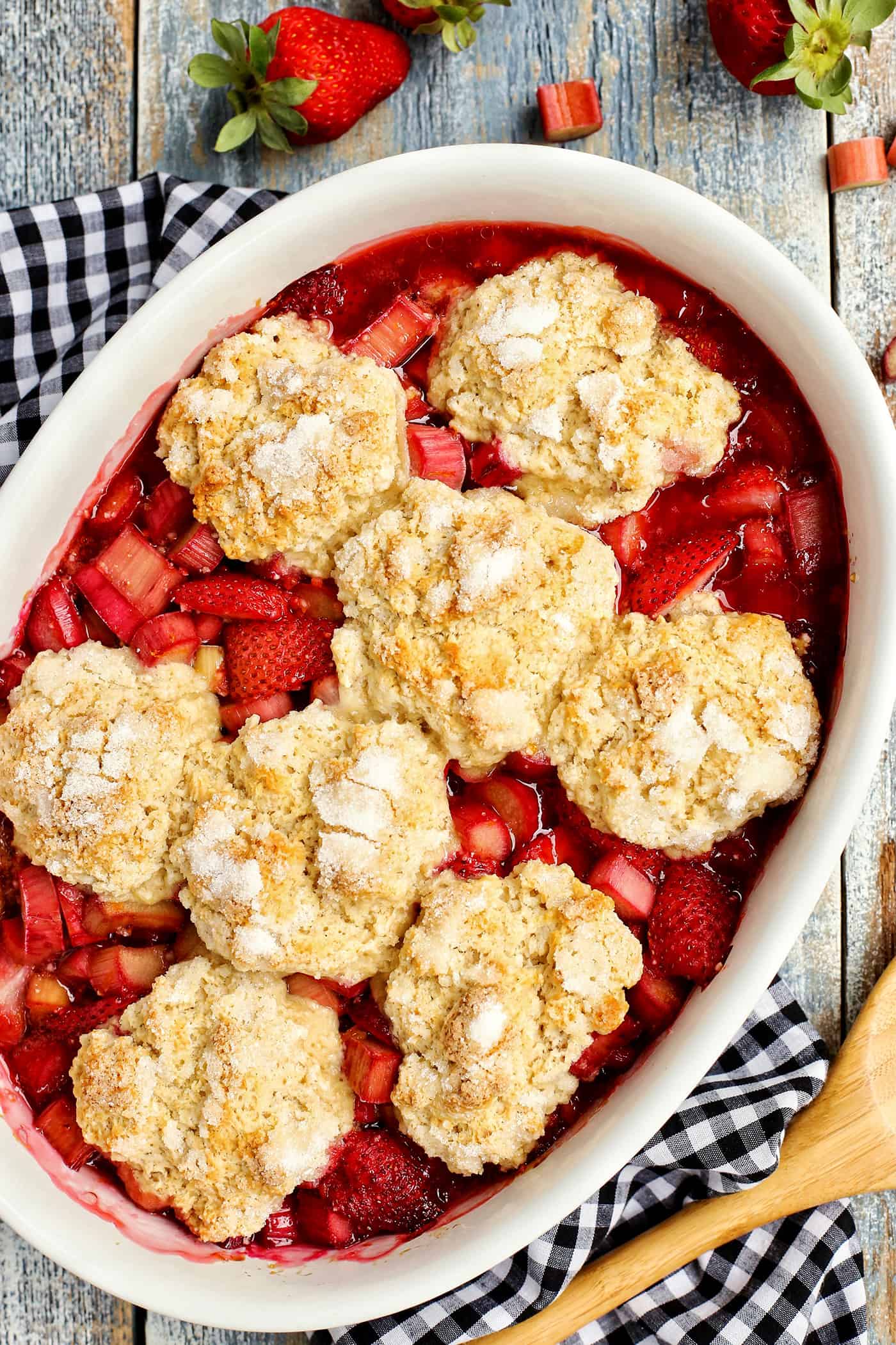 Overhead view of Strawberry Rhubarb Cobbler in an oval baking dish
