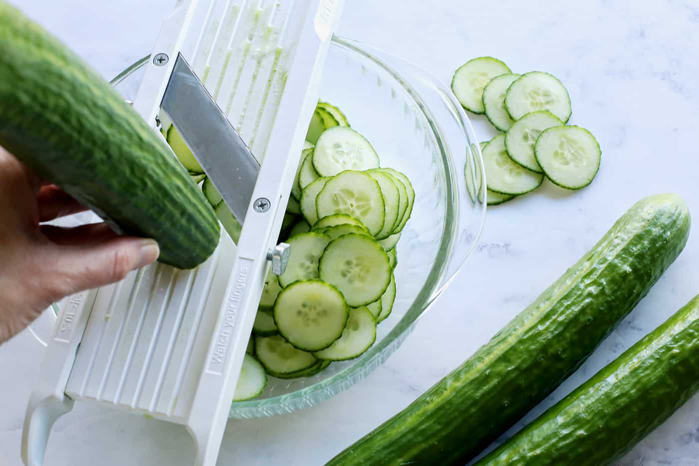 slicing cucumbers with a mandoline