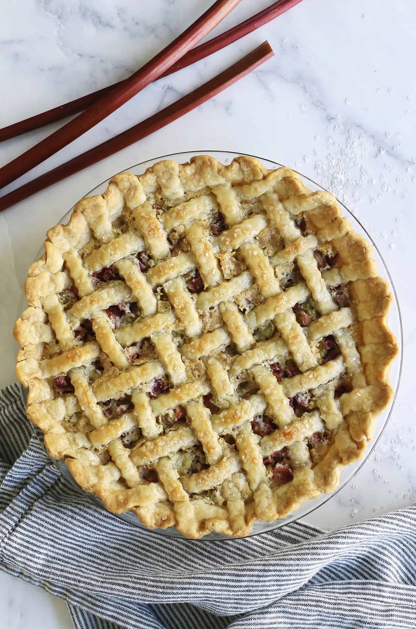 baked rhubarb custard pie with lattice crust