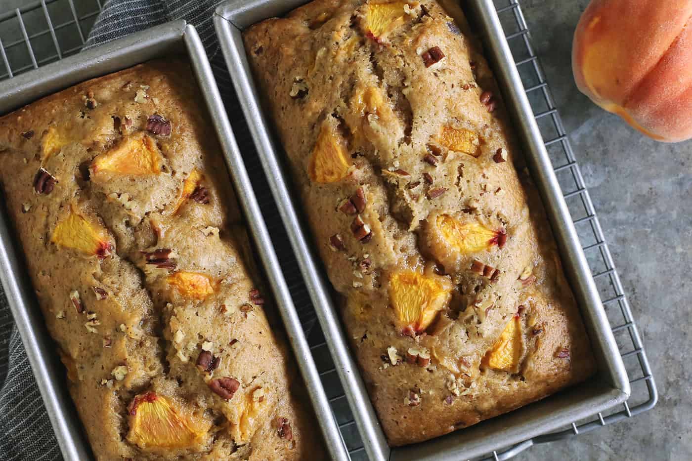 overhead photo of two pans of baked peach bread