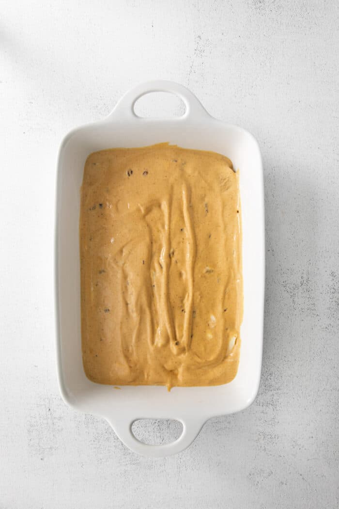 Overhead shot of Pumpkin Icebox Cake after first layer of ice cream