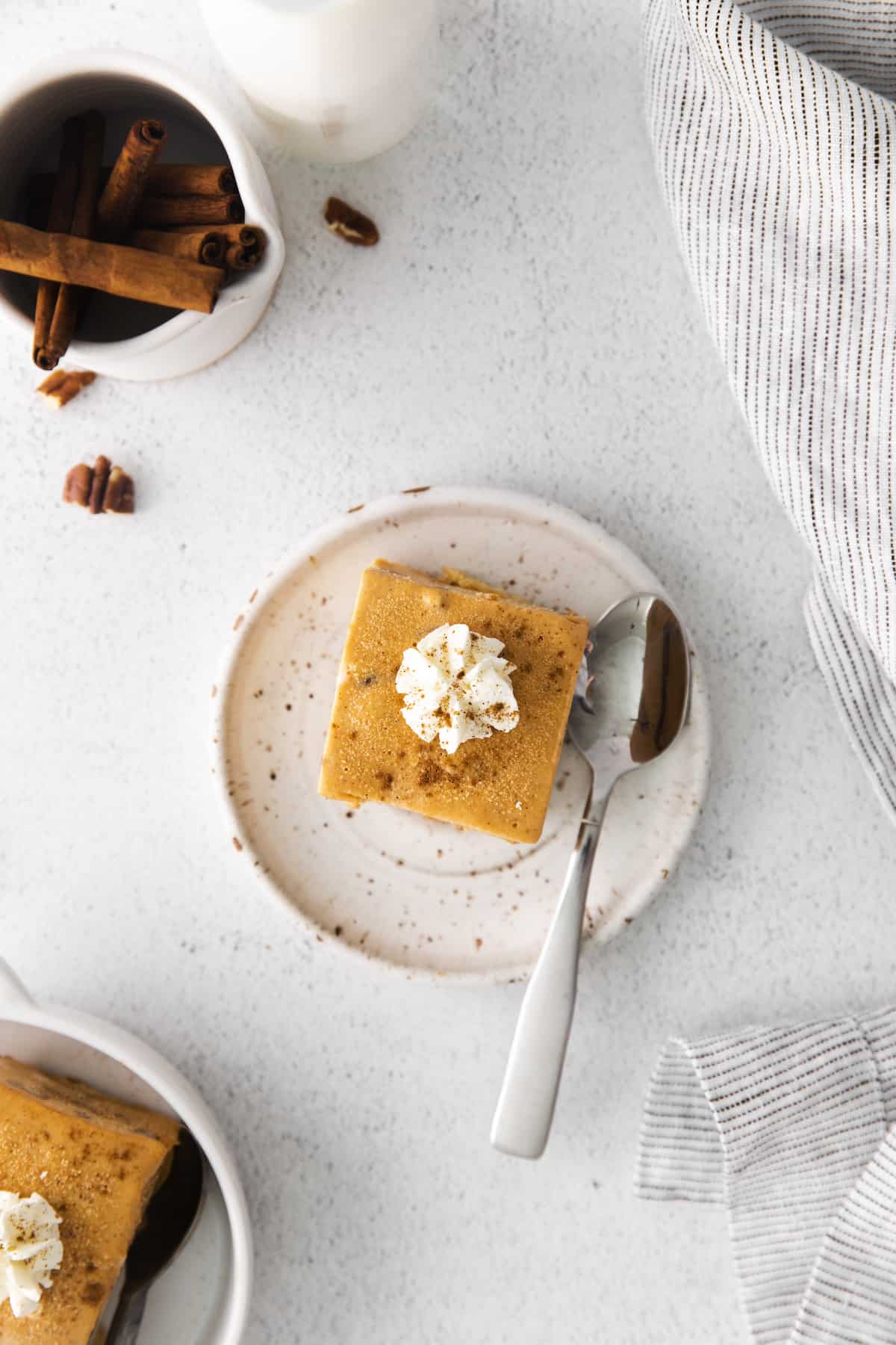 Overhead shot of Pumpkin Icebox Cake on plate with spoon