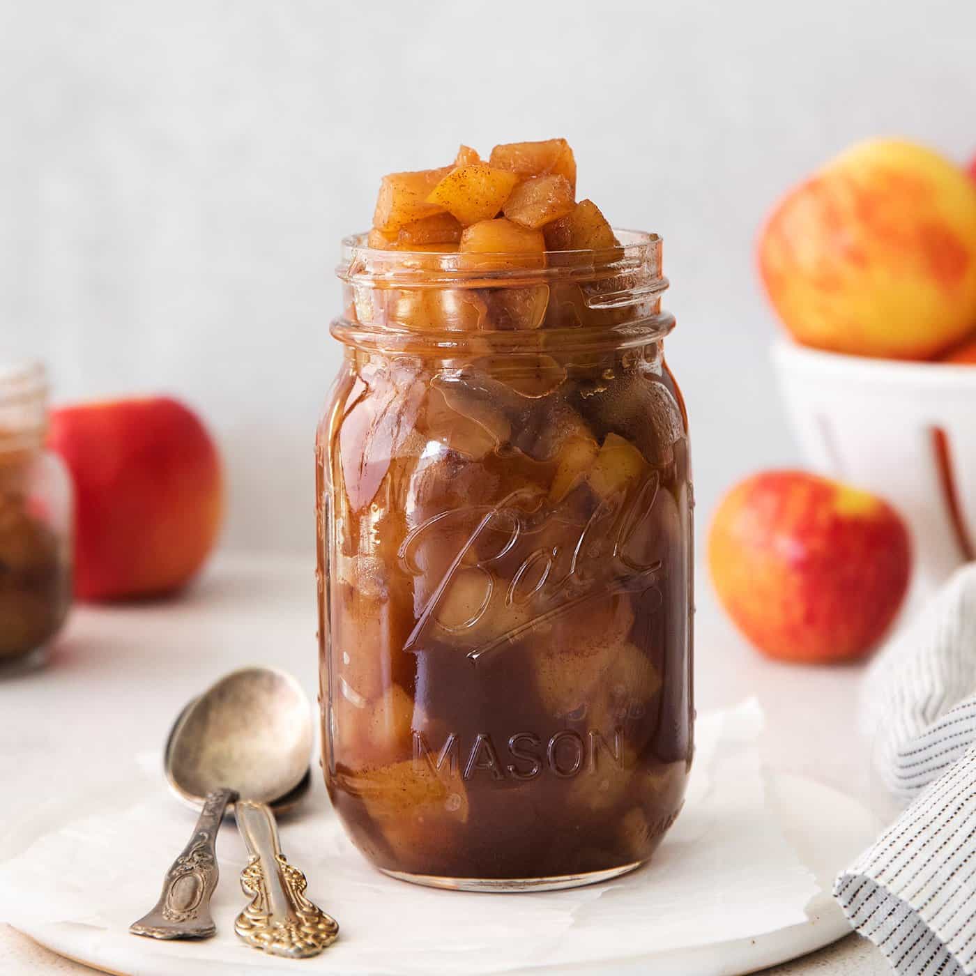 easy homemade applesauce recipe, shown in a canning jar