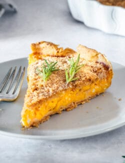 a piece of butternut squash tart on a plate