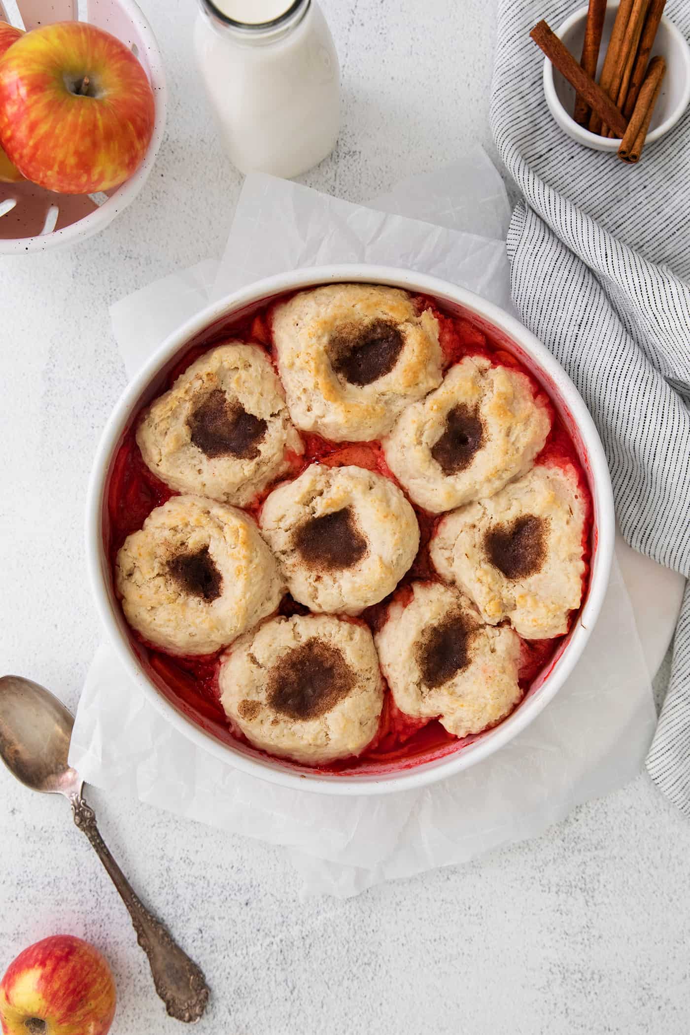 baked apple dessert in a round white baking dish