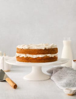 pumpkin layer cake with layers of creamy whipped topping