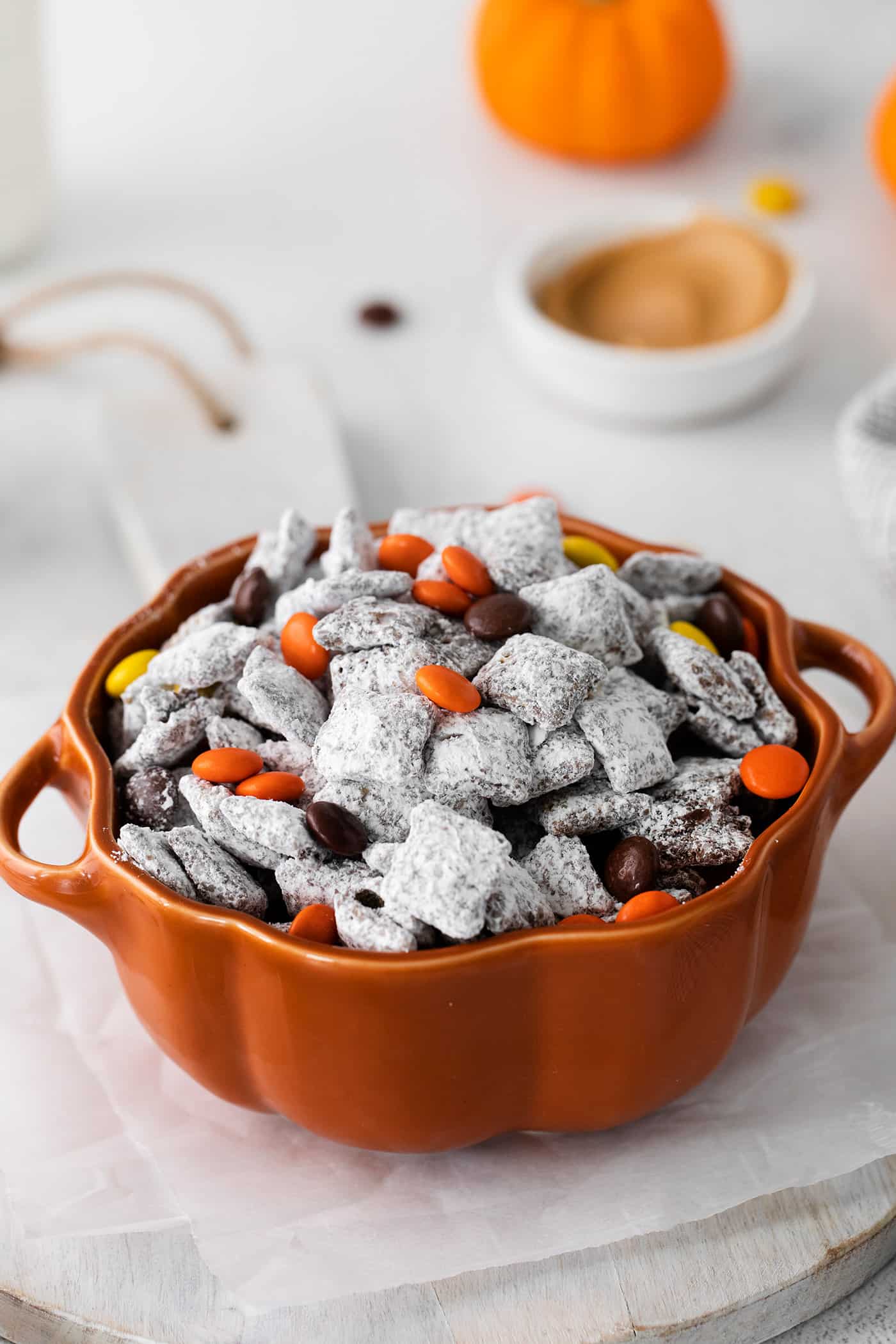 Puppy Chow (aka Muddy Buddies) for Halloween, in a pumpkin bowl