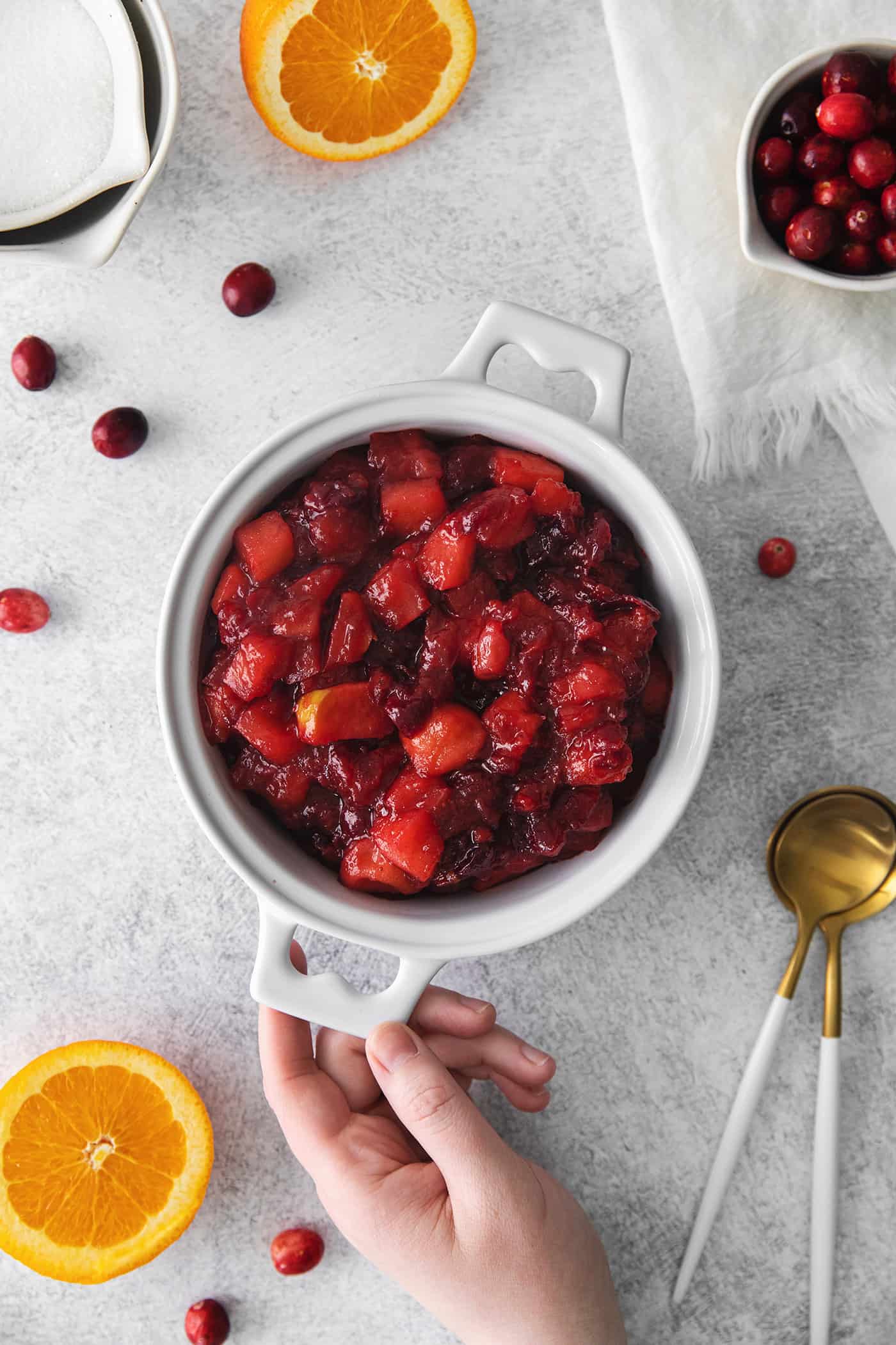 a white bowl with homemade cranberry sauce