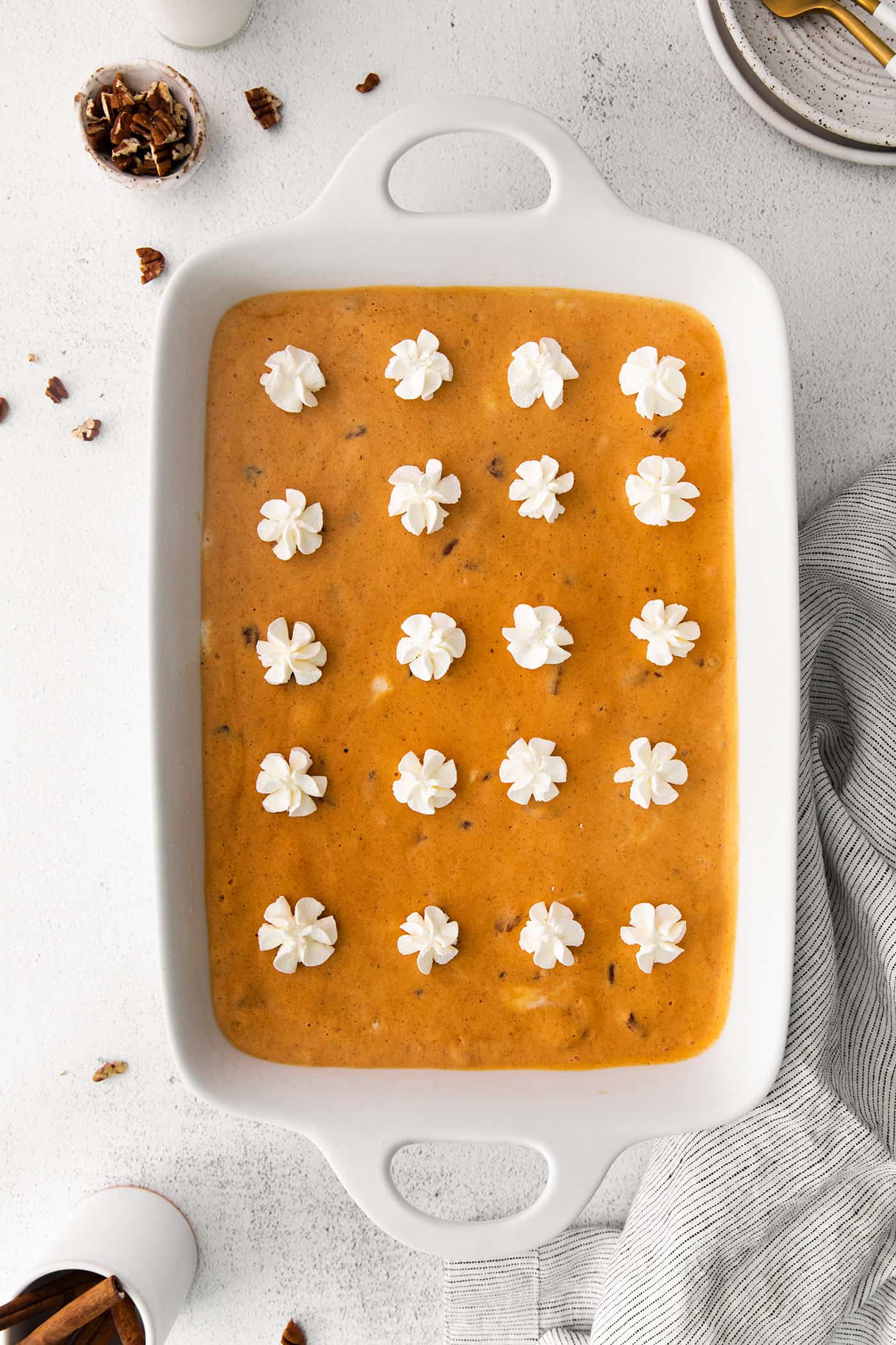 no-bake pumpkin dessert in a white pan