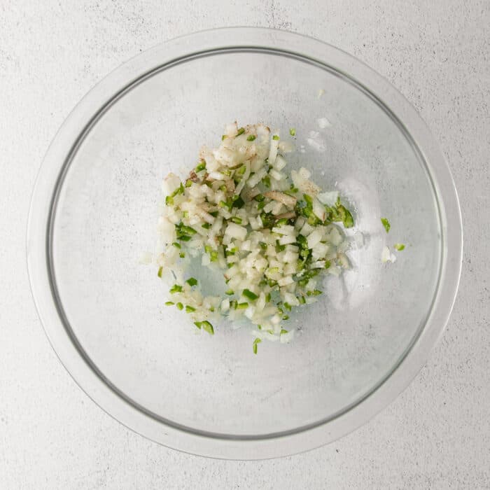 Crushed garlic in a white bowl