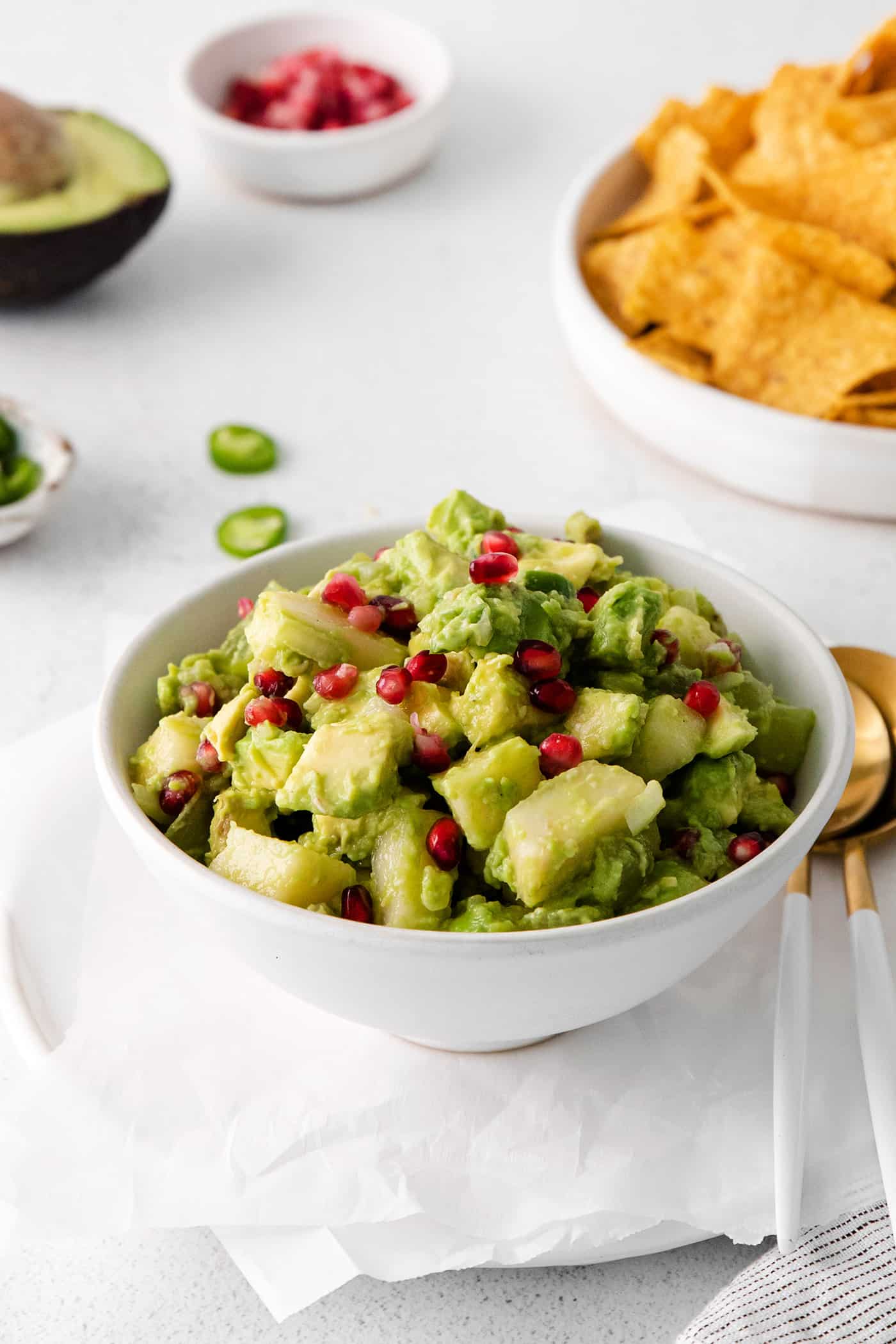 A bowl of pomegranate guacamole