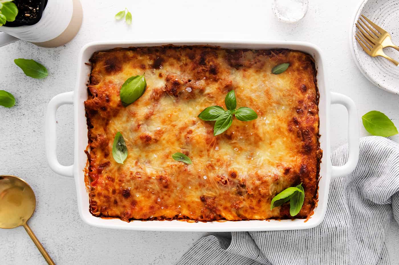 Overheadview of classic lasagna in a white baking dish