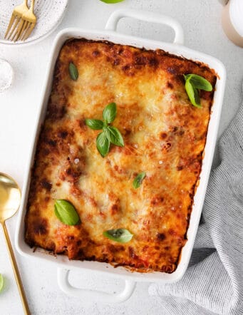 Overheadview of classic lasagna in a white baking dish