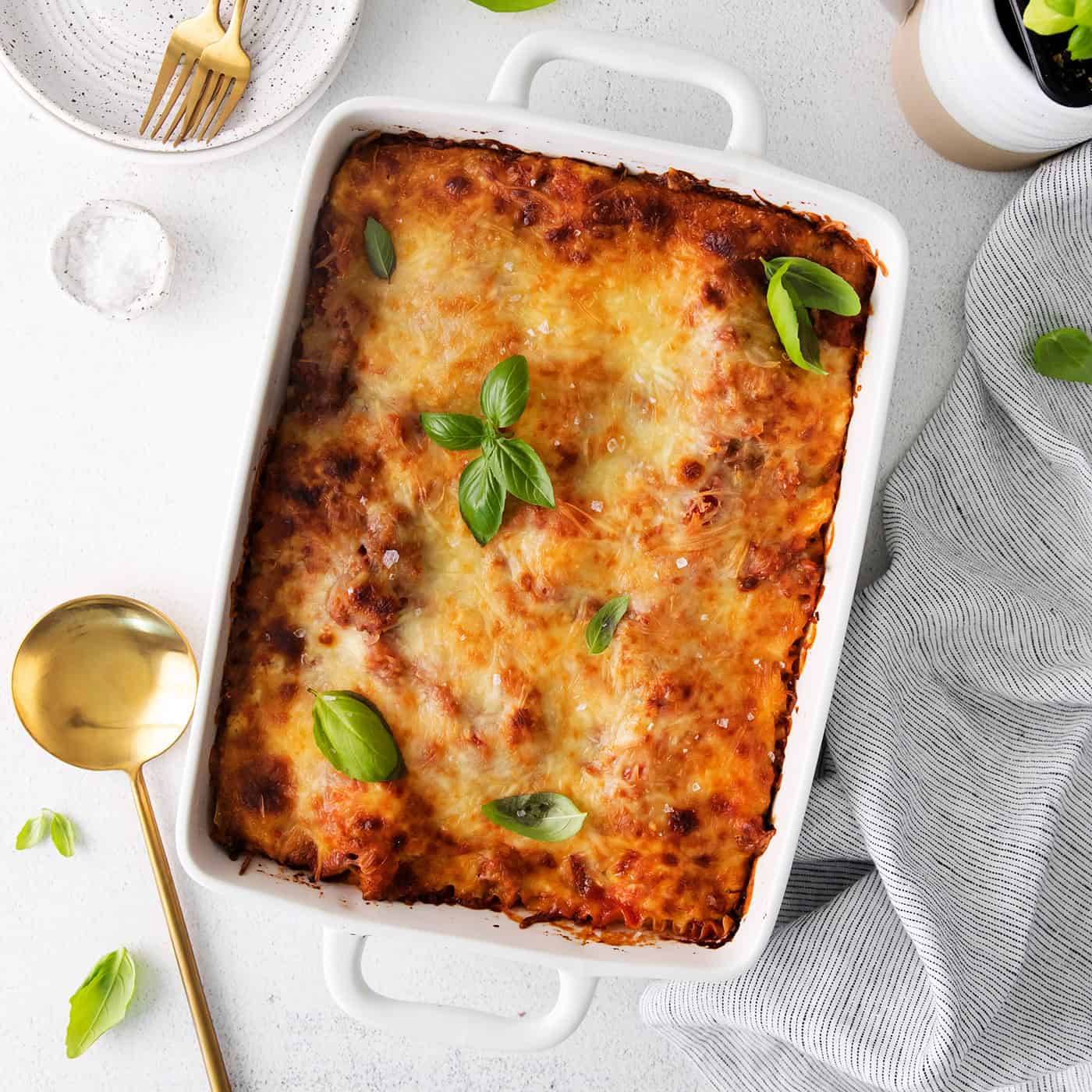 Overheadview of classic lasagna in a white baking dish