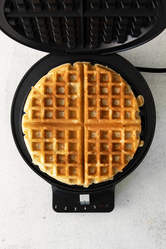 Overhead view of a waffle in a waffle iron