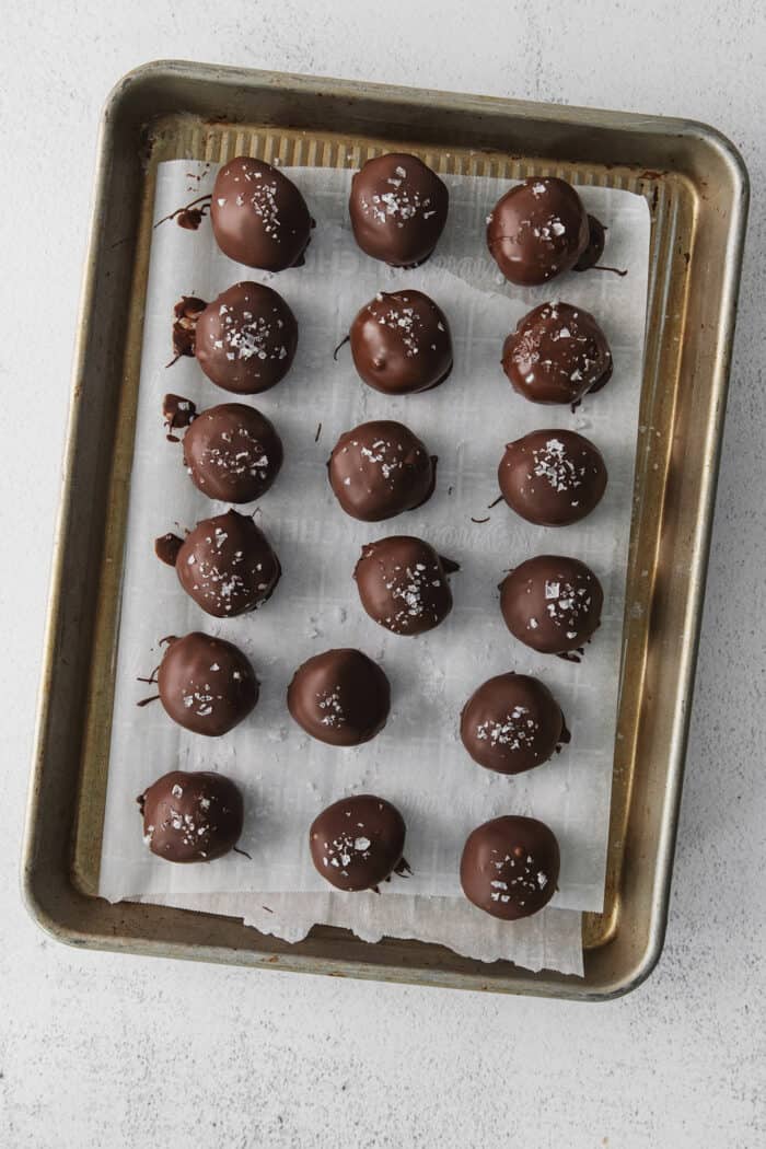 Cookie dough truffles on a baking sheet