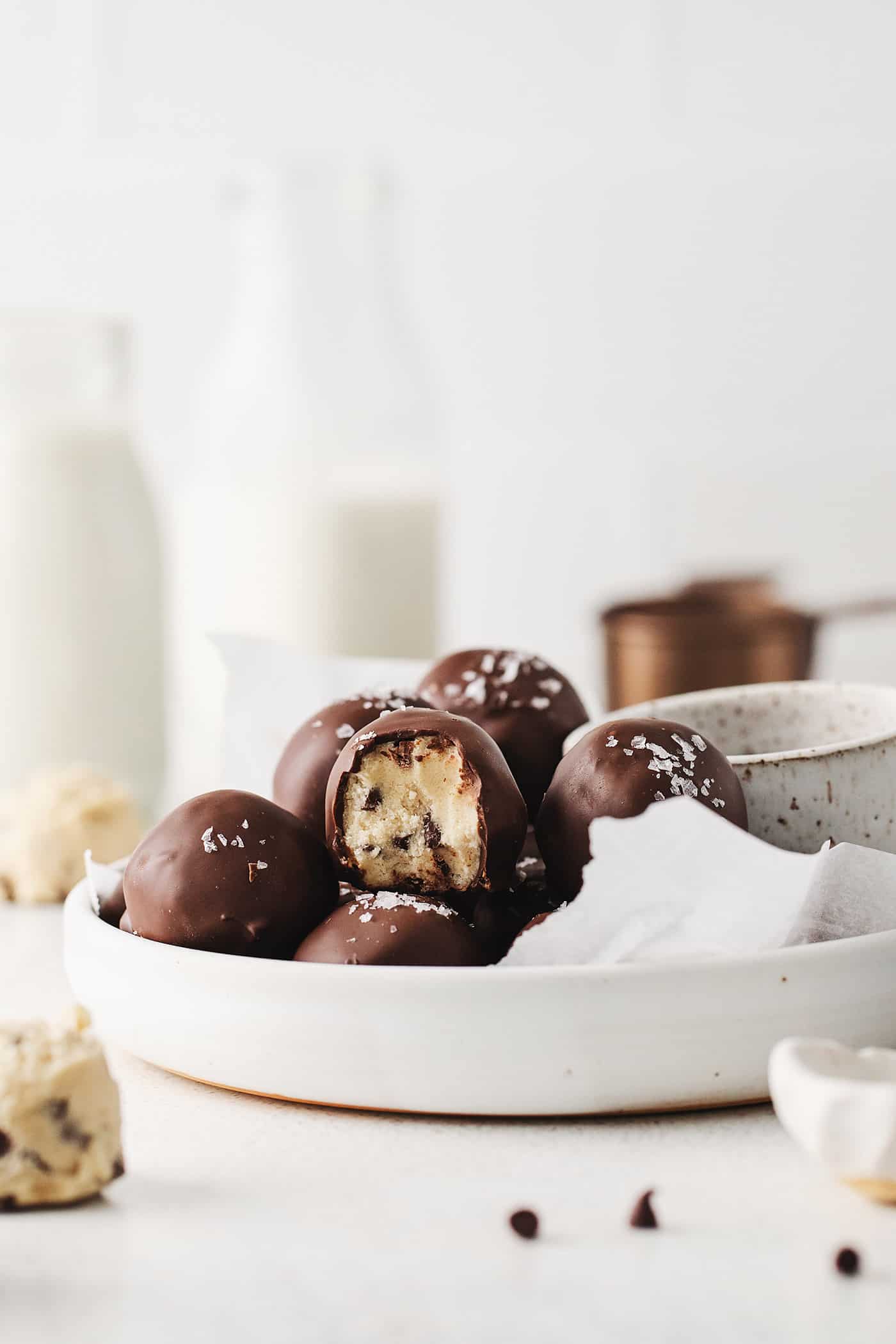 Angled view of a plate of cookie dough truffles