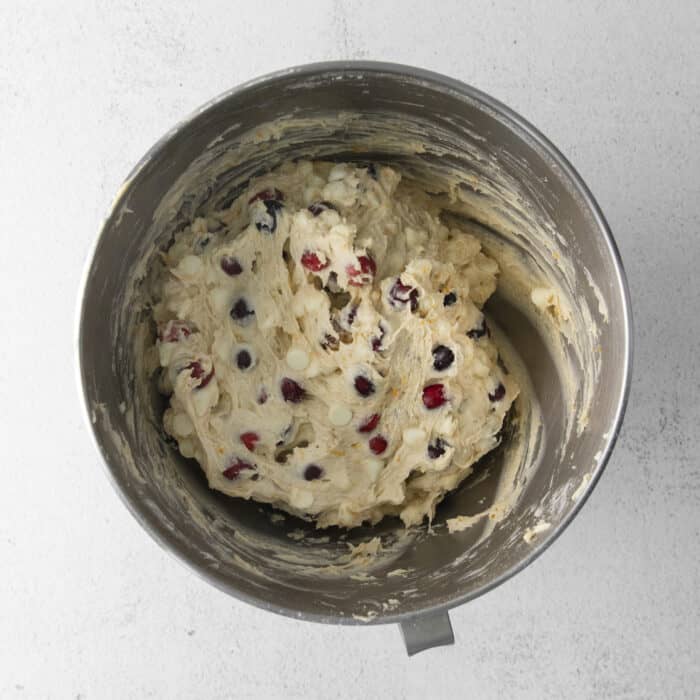 batter for orange coffee cake in a stainless steel mixing bowl