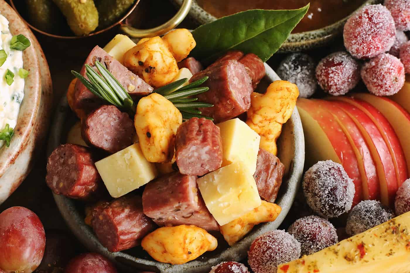 "Meat & Cheese Trail Mix" with bites of meats and cheeses in a bowl