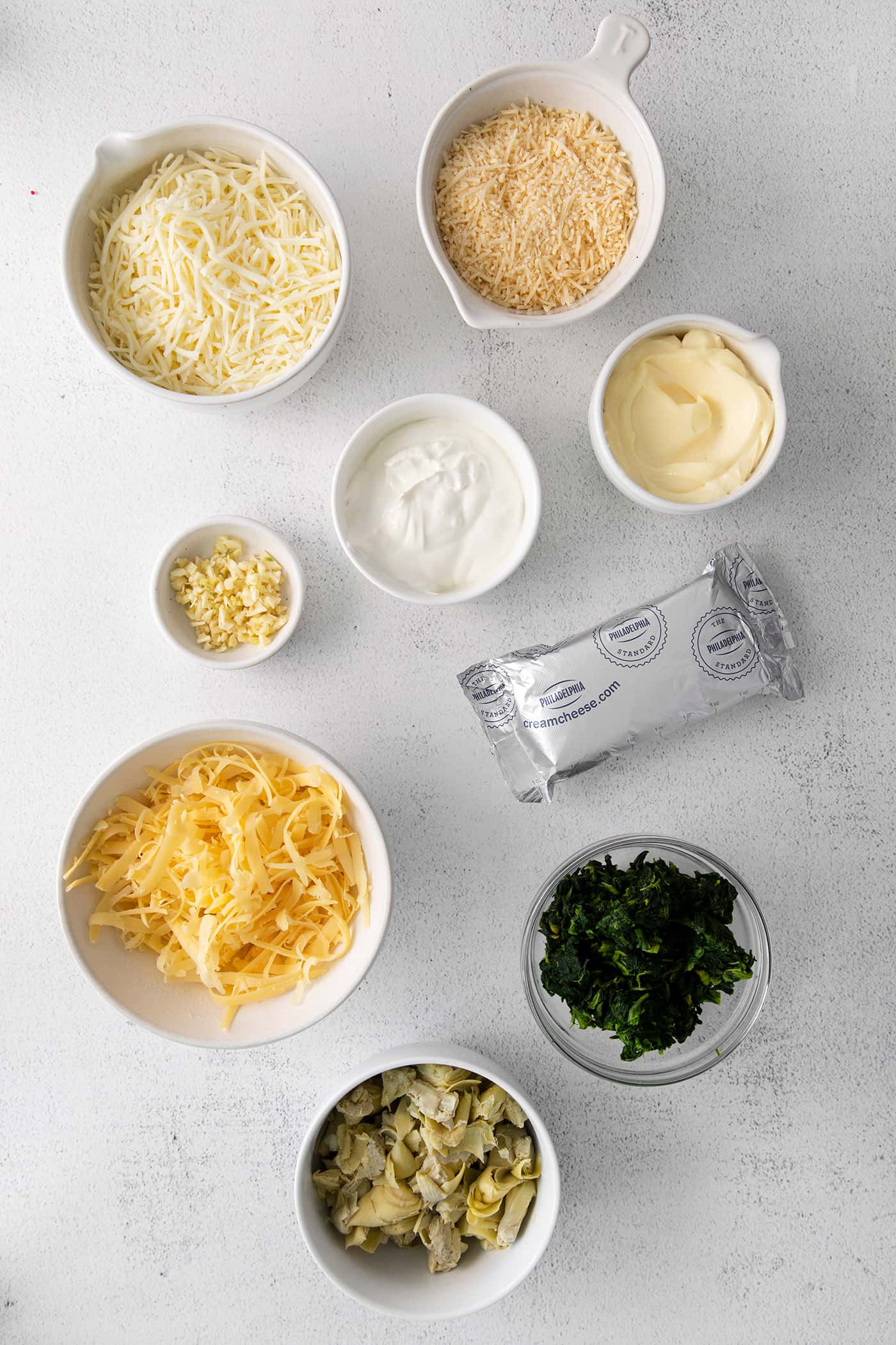 Overhead of spinach and artichoke dip ingredients