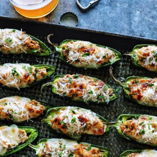 halved jalapeno peppers stuffed with Italian sausage and cheese
