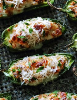 close-up overhead photo of baked stuffed jalapeno peppers