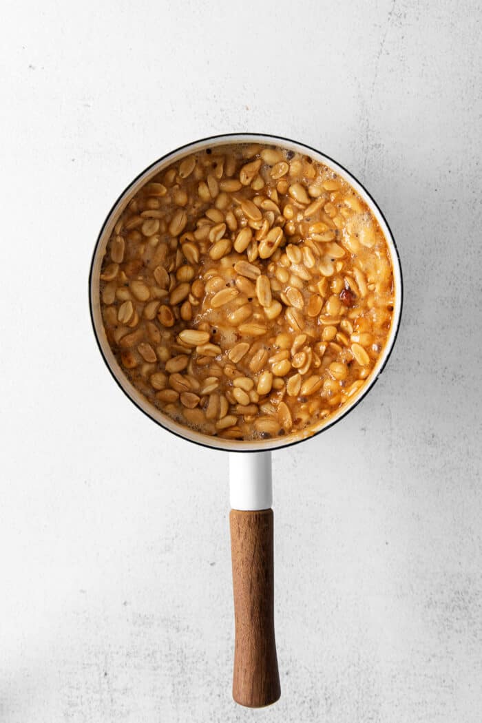 Peanuts bubbling in a sugar water mixture