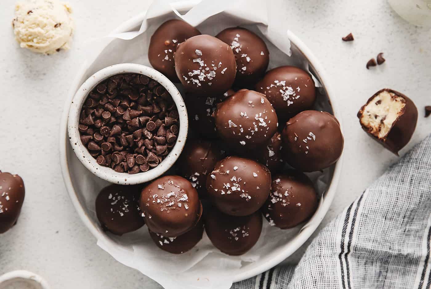 chocolate chip cookie dough truffles in a white dish