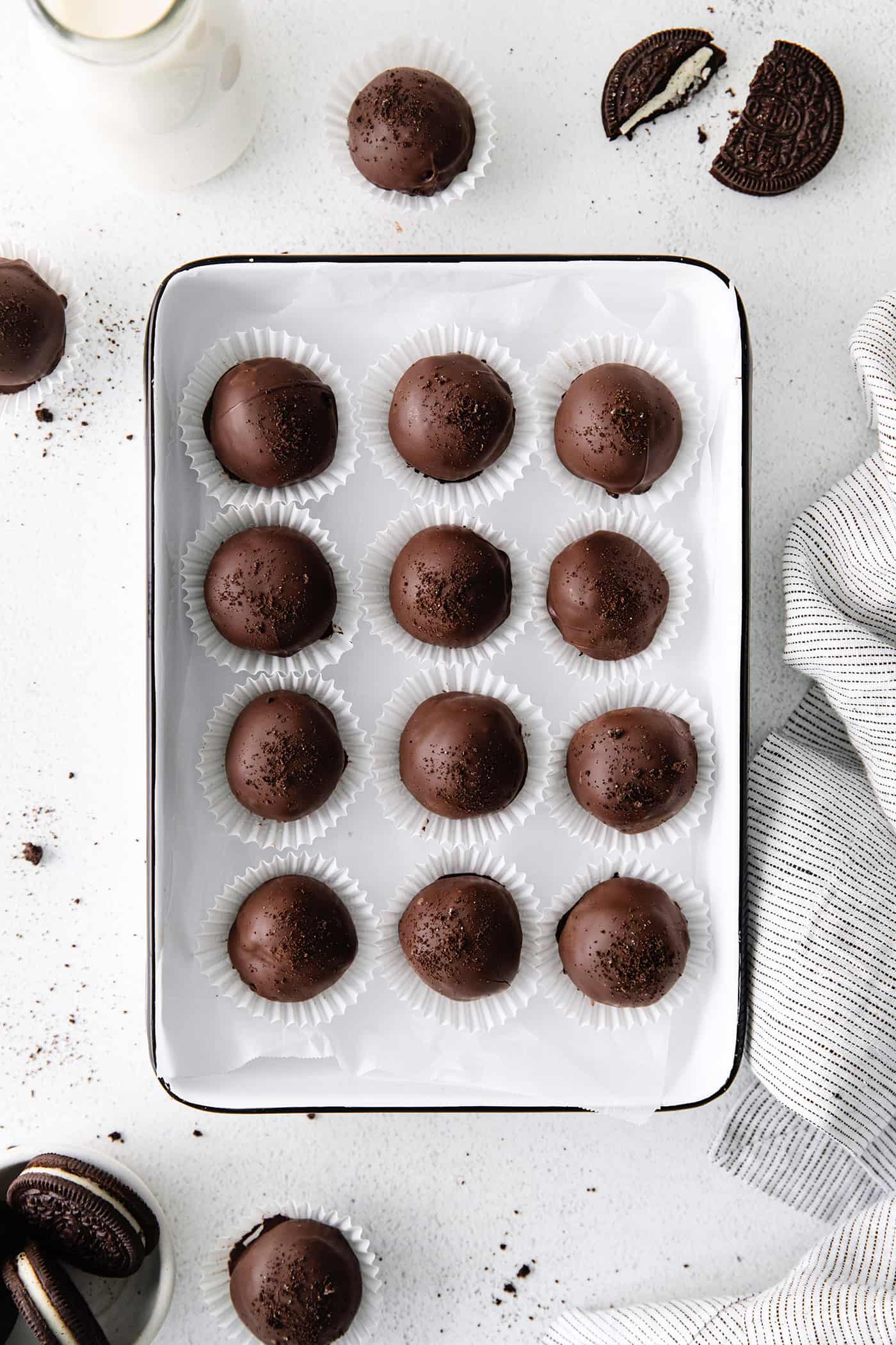 Overhead view of Oreo truffles on a baking sheet