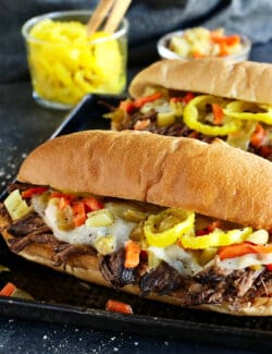 angled view of 2 Italian beef sandwiches