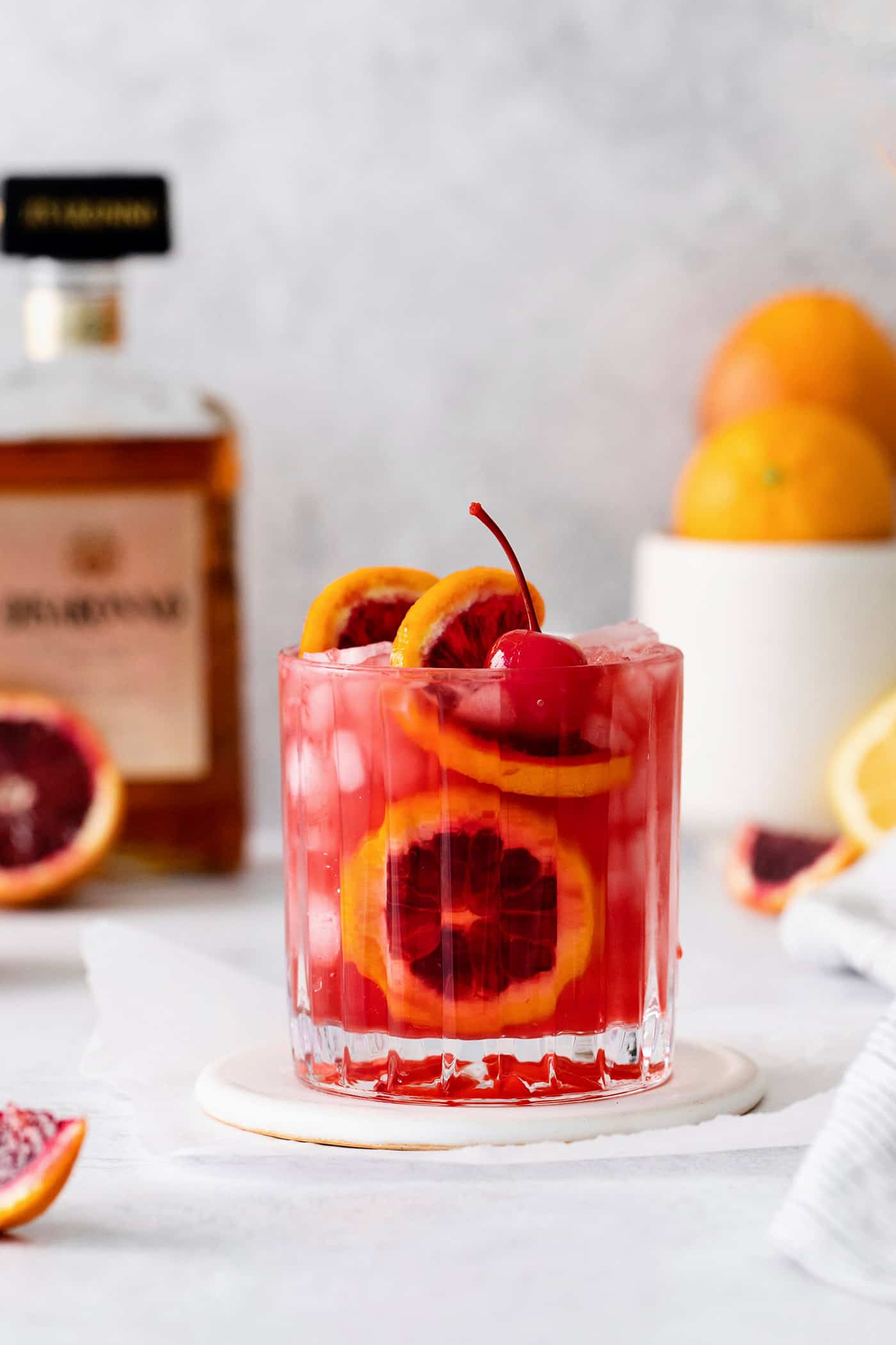 blood orange amaretto sour in a cocktail glass