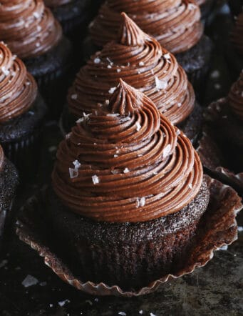 Close up of chocolate buttercream on cupcakes