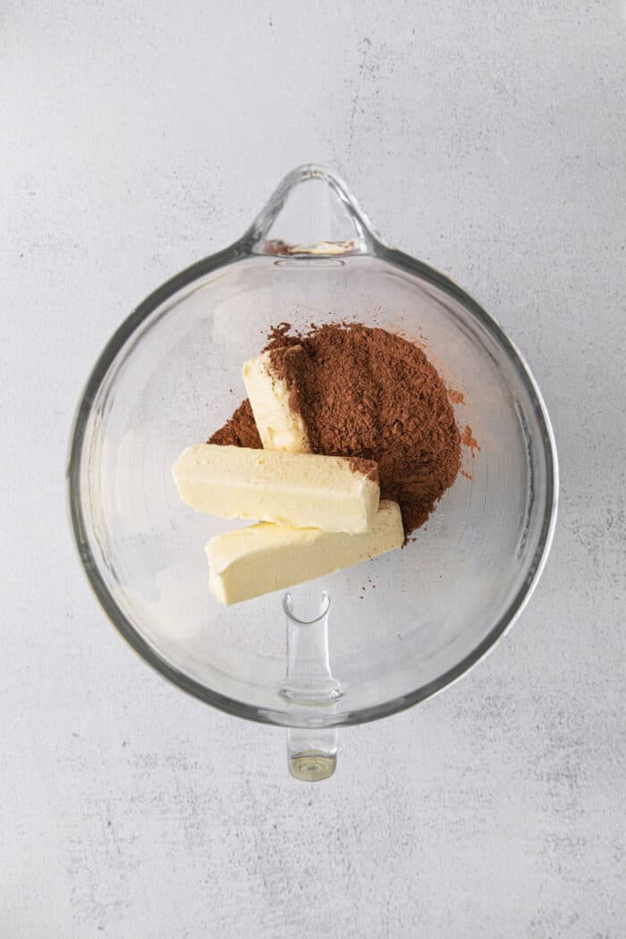 Butter and cocoa powder in a mixing bowl