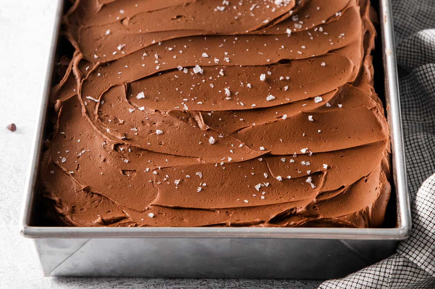 Angled view of half a pan of chocolate wacky cake