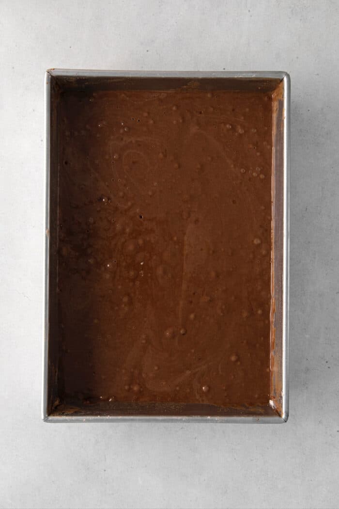 Chocolate wacky cake batter in a pan