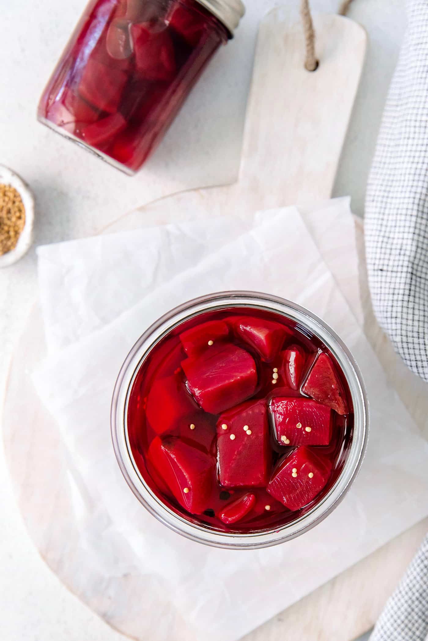 overhead photo of pickled beets in a jar