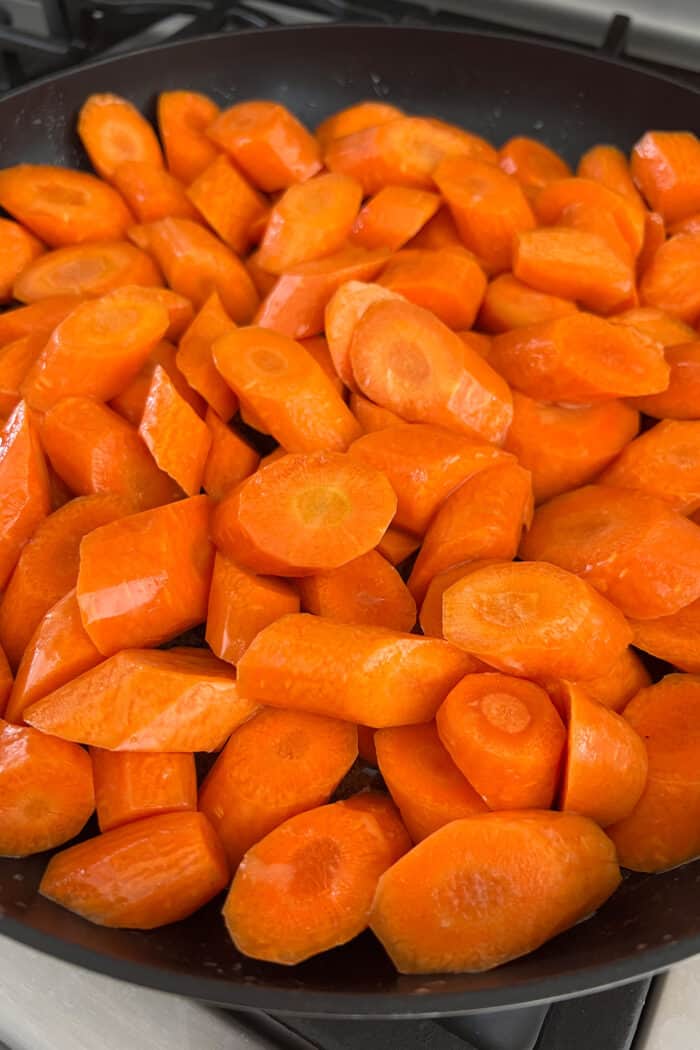 cut carrots in a skillet