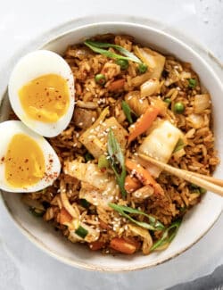 Overhead view of a bowl of kimchi fried rice