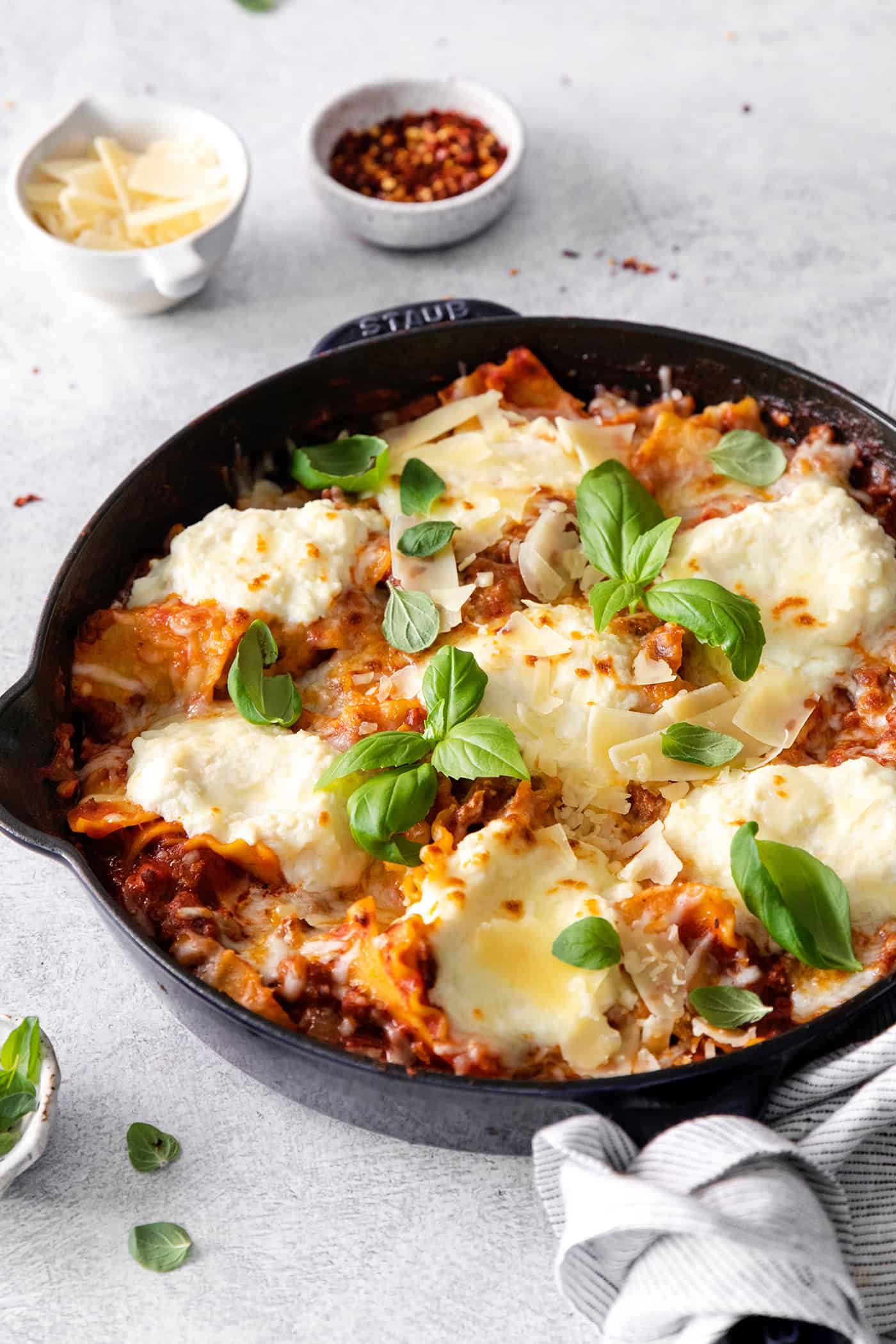 Angled view of freshly made skillet lasagna