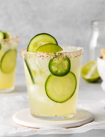 A jalapeno cucumber margarita with a spicy salt rim