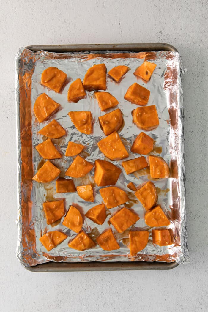 Cubes of sweet potato on a baking sheet