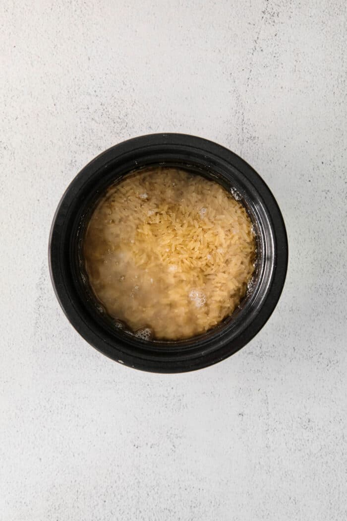 Brown rice in a black rice cooker